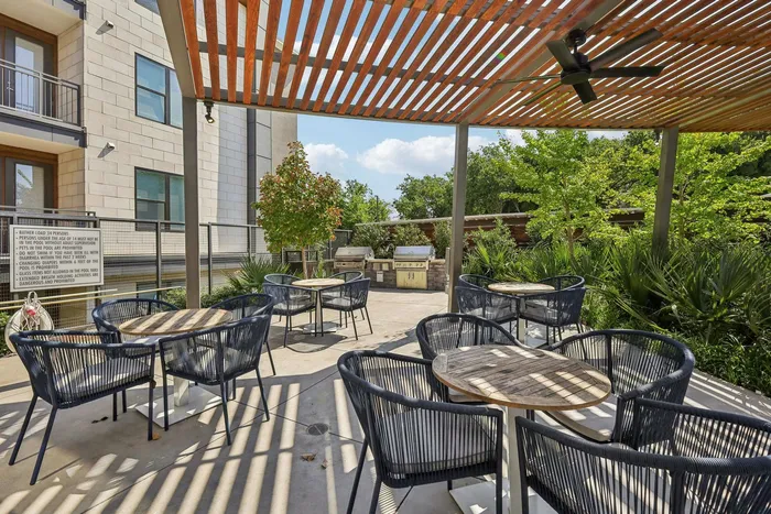 Seating by the outdoor grill area.