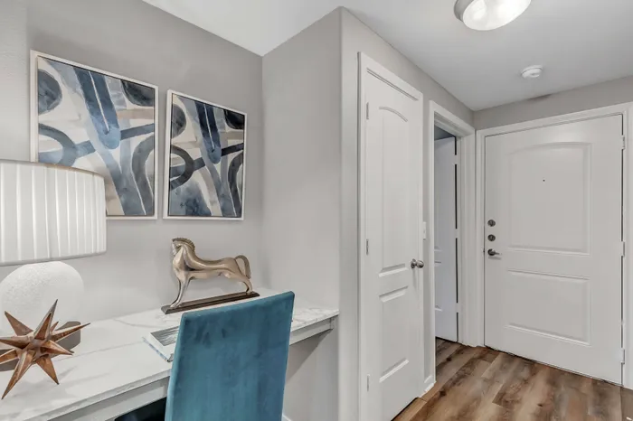 Dedicated workspace with built-in desk and contemporary décor at Amalfi at Tuscan Lakes in League City, TX.