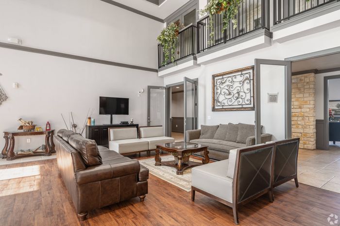 Sophisticated clubhouse with lounge seating at Mansions at Moses Lake in Texas City, TX