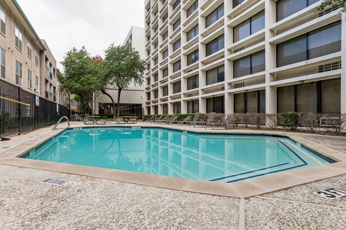 sparkiling pool beside the towers