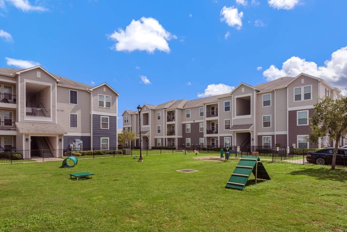 Enjoy a spacious, well-maintained dog park at The Retreat in Corpus Christi, TX, perfect for dogs to run and play.