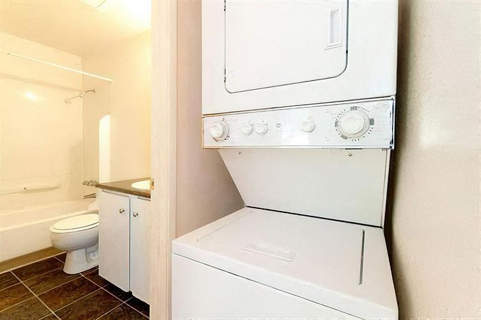 Modern in-unit washer and dryer set at Cottage Bay Apartment Homes, Bremerton, WA