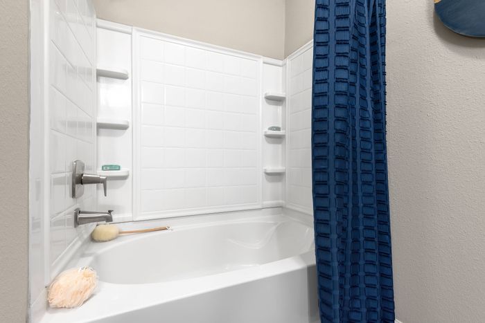 Luxurious oversized soaking tubs at The Retreat in Corpus Christi, TX for ultimate comfort and relaxation.