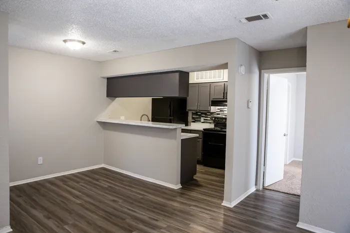 state of the art kitchen with window open to the living space