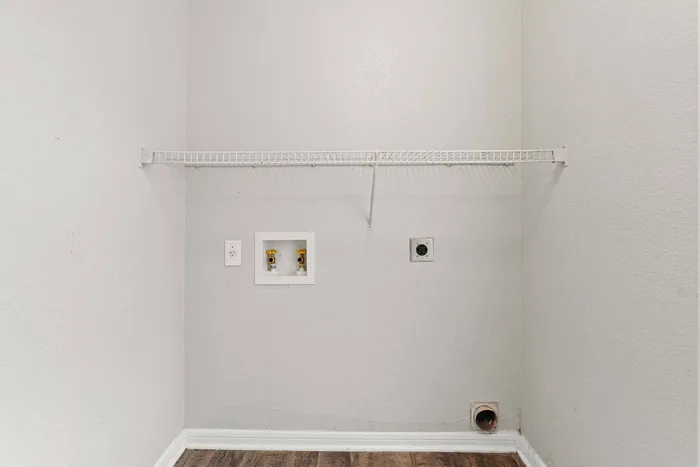Washer and dryer hookup services at Crescent Village Apartments, Elgin, TX