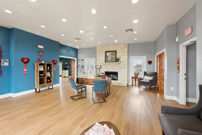 Spacious clubhouse with modern amenities at Crescent Village Apartments in Elgin, TX