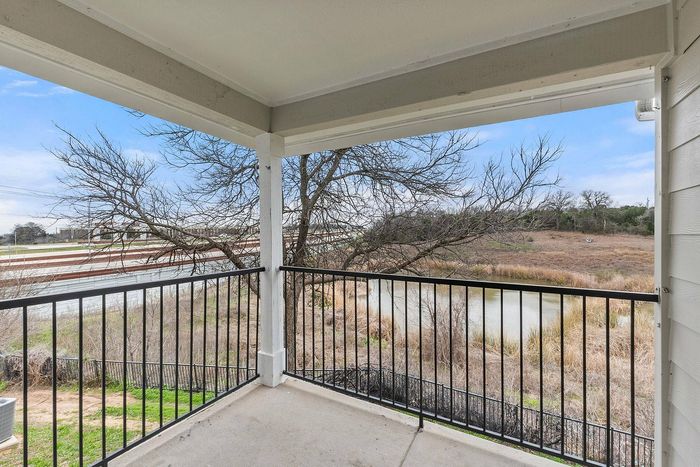 Patio with seating and scenic views at Fort Branch in Truman's Landing, Austin, TX