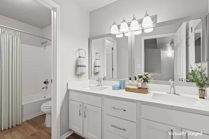 Spacious bathroom with sleek fixtures at Avonmora Apartments in Austin, TX