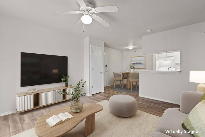 Modern living room at Ovation Apartments in Austin with stylish furniture and natural light