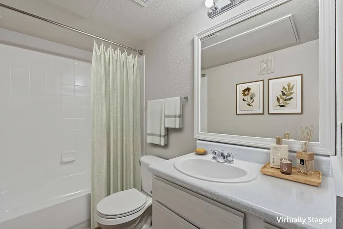Bright, spacious bathroom with modern fixtures in a luxury apartment at Ovation Apartments in Austin, TX.