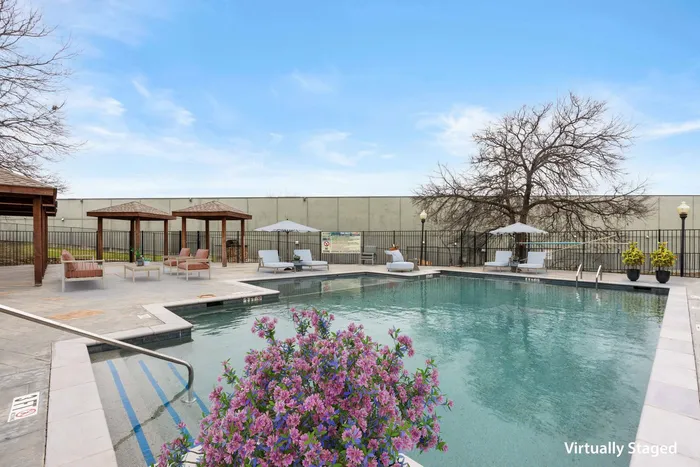 Sparkling swimming pool at Ovation Apartments in Austin, TX