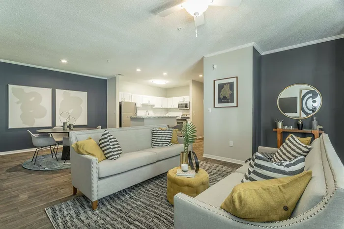 Modern living room with comfortable seating at Avenues of Kennesaw apartments