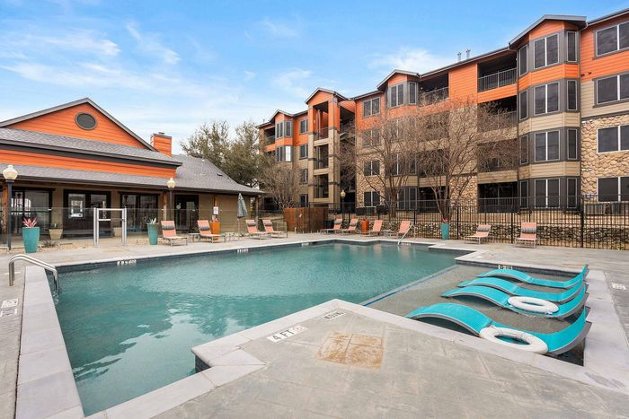 Enjoy resort-style living at Ovation Apartments in Austin, TX. Relax by our sparkling swimming pool and take in stunning city views. Schedule a tour today!