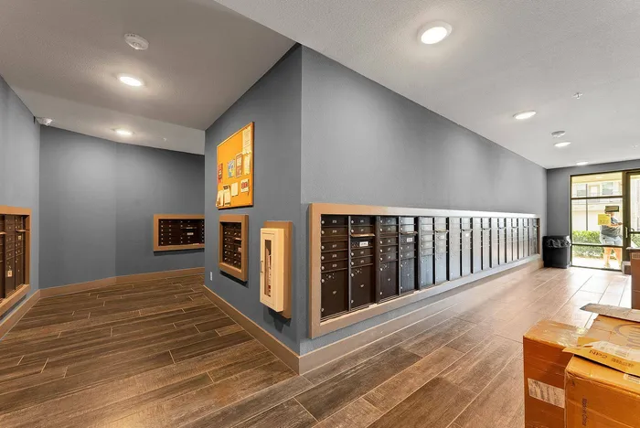 Resident mail center with individual mailboxes at Discovery Park Apartments in Denton, TX