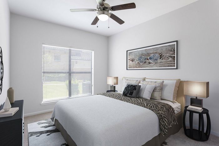 Spacious modern bedroom with natural light at Allora Bella Terra in Richmond, Texas