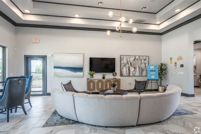 Resident lounge at Towne West Apartments with modern furniture and decor
