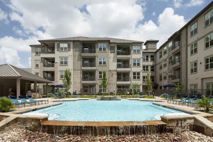 Daytime view of resort-style pool at McDermott 55