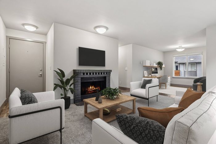 wood burning fireplace in the living room at Vibe Appartments