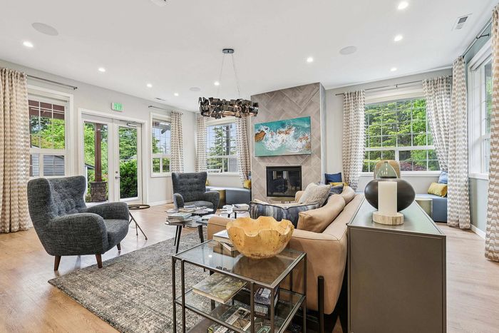 spacious and stylish clubhouse with a lot of seating options