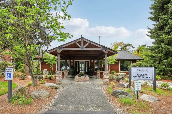 front of leasing center building with landscaping at The Ardent