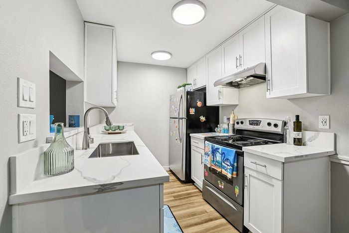 State of the art kitchen with stainless steel appliances at The Ardent
