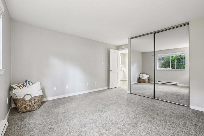 spacious bedrooms with carpeting at The Ardent