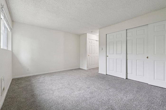 Modern bedroom in one‑bedroom unit at Foster Creek Tukwila