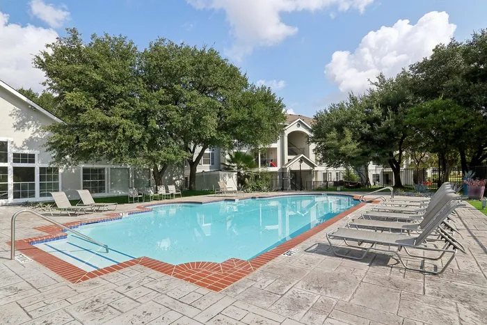 Residents gathering at Avonmora&rsquo;s sparkling community pool in Austin, TX