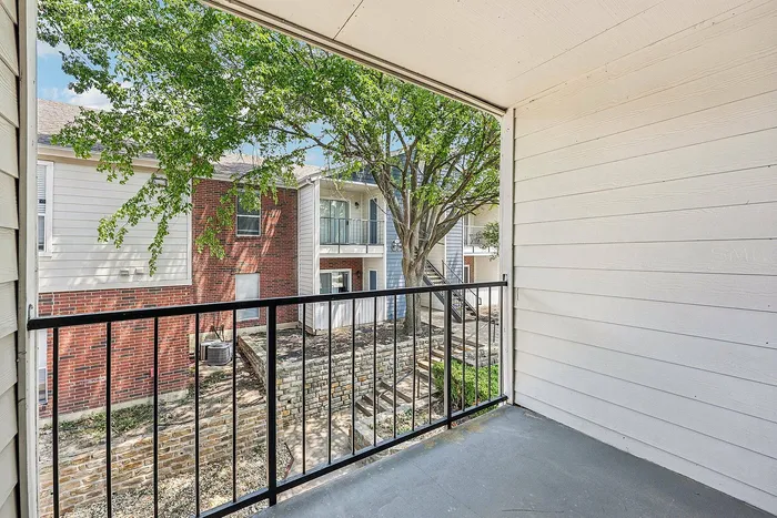 Modern apartment balcony at Collin Creek Apartments Plano TX