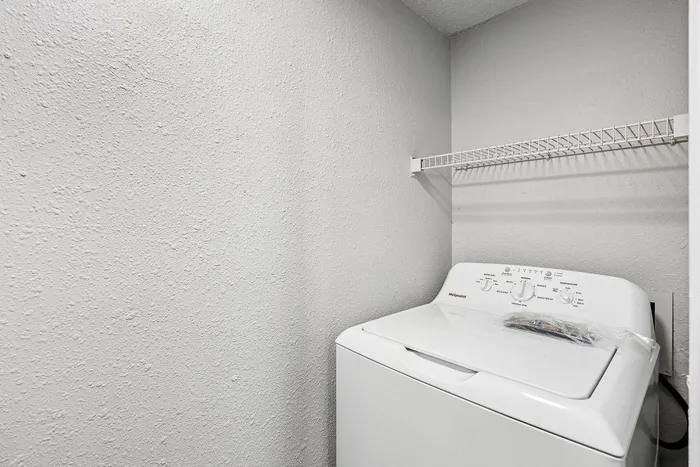 In-unit full-size washer dryer hookups in Plano Collin Creek Apartments
