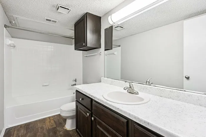 Modern bathroom with sleek finishes at Collin Creek Apartments in Plano, TX