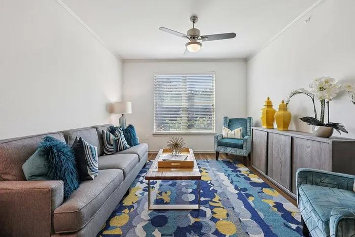 Modern living room at McDermott 55 senior apartments in Plano, TX