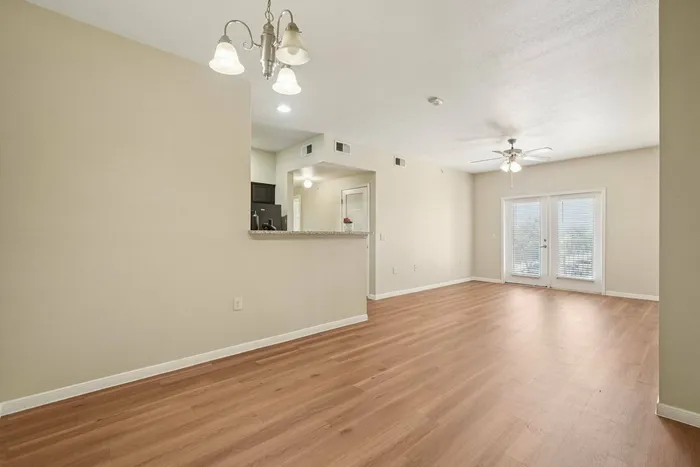 Spacious living room at Walnut Grove apartments in Seguin, TX