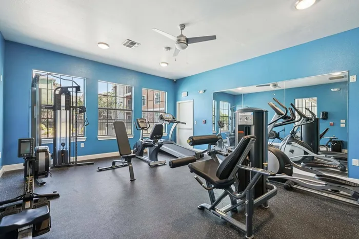 Modern fitness center with cardio and strength equipment at Walnut Grove, Seguin, TX
