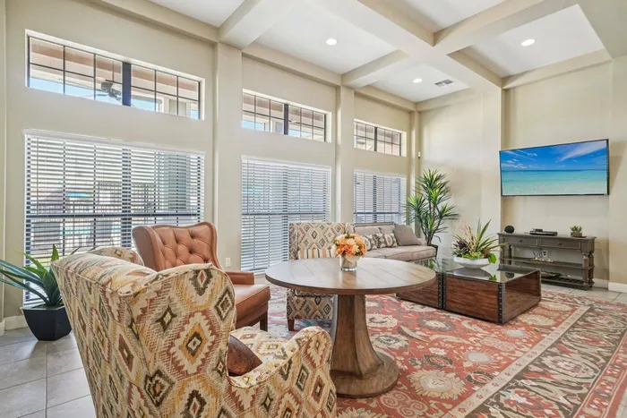 Indoor sitting area with comfortable seating at Walnut Grove apartments in Seguin, TX
