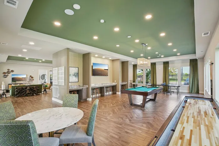 Pool tables in the residents&rsquo; billiards room at Cityscape Apartments Houston