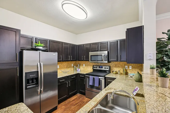 All-electric kitchen in a Providence Uptown apartment, Houston, TX