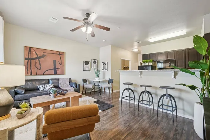 Modern living room and dining area at Arroyo Seco Villas in San Antonio, TX