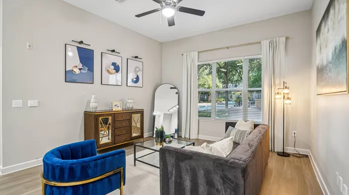Modern living room with natural light at Addison Keller Springs in Addison, TX