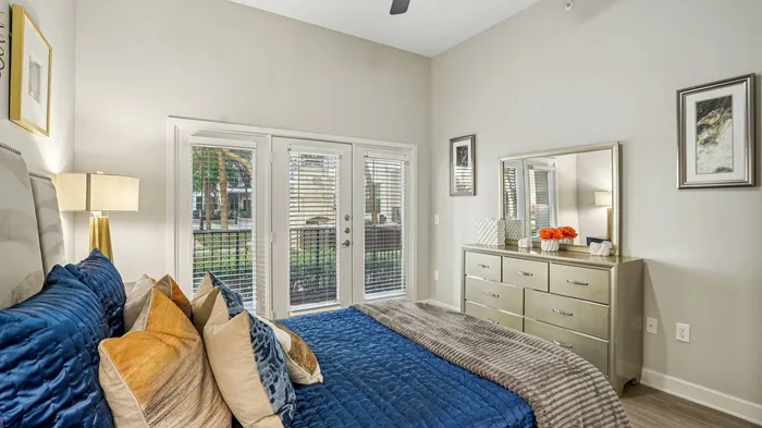 Modern bedroom at Addison Keller Springs apartments in Addison, TX