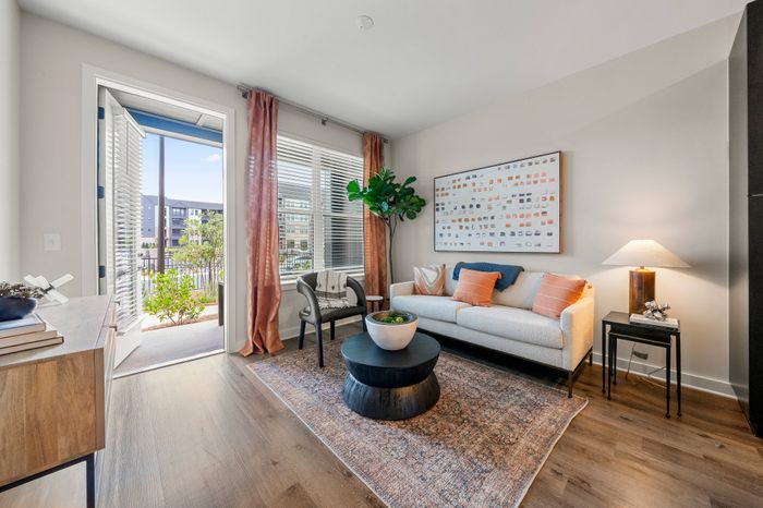 Large living space with balcony access