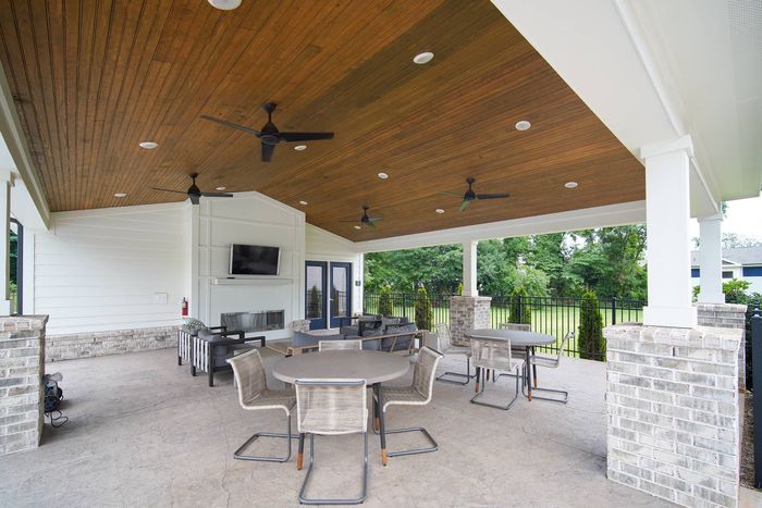 outdoor lounge with fireplace