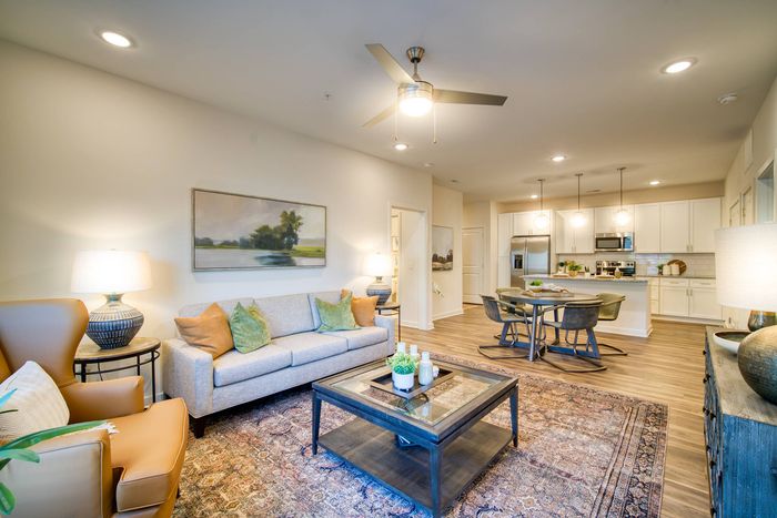 living space with cieling fan
