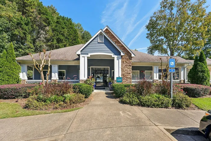 Exterior view of the leasing office at Avenues of Kennesaw in Kennesaw, Georgia