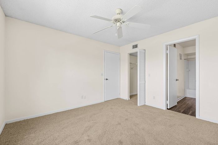 spacious bedrooms with walk in closets