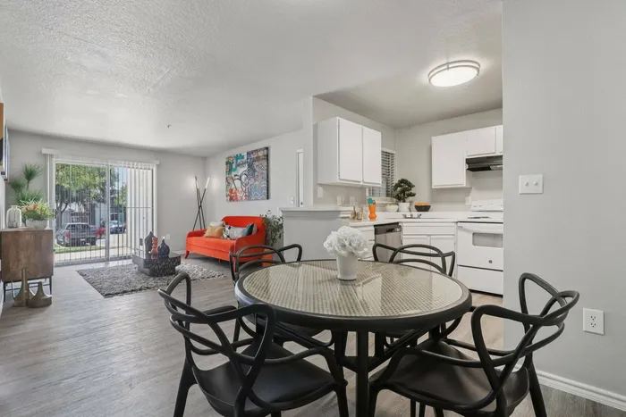 Dining nook open to living area and kitchen