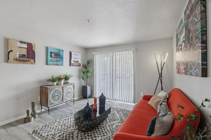 Modern living room at Avonmora apartments in Austin, TX with stylish furniture