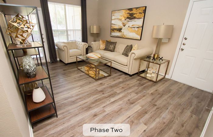 Spacious living room with wood style flooring