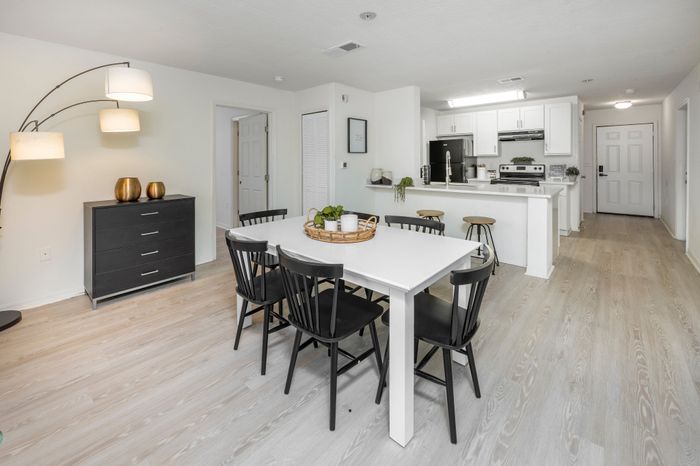 spacious living area with wood style flooring