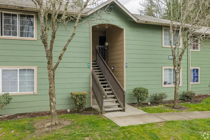Apartment building with green siding